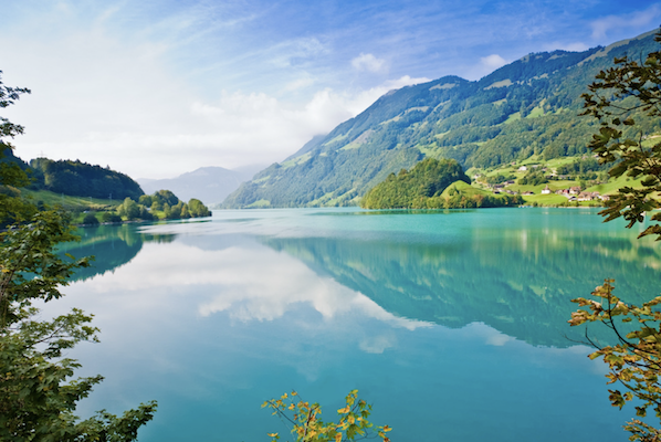 Aqua blue lake, surrounded by mountains
